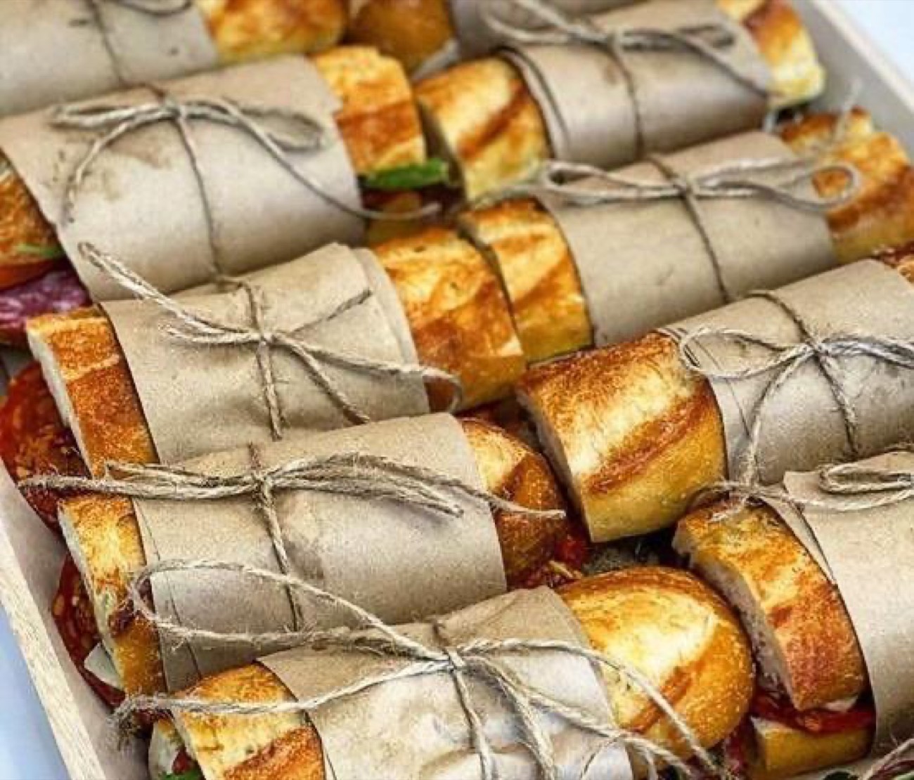 Wrapped baguettes tied with string