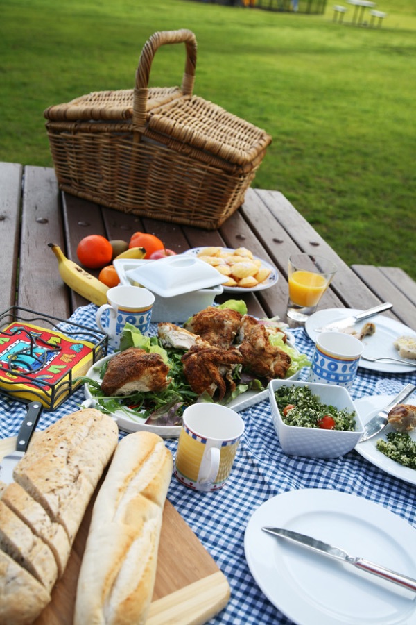 A picnic hamper spread on a table
