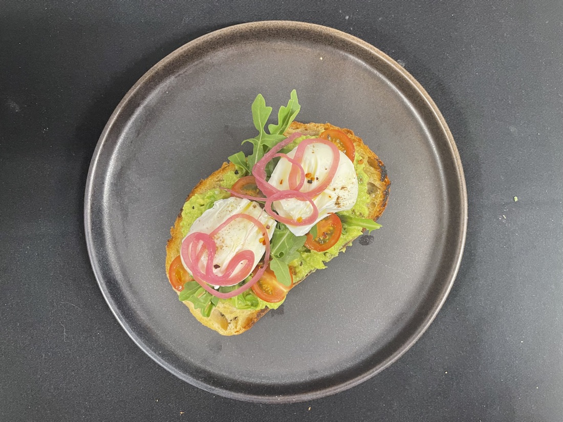 Avocado and poached eggs on sourdough