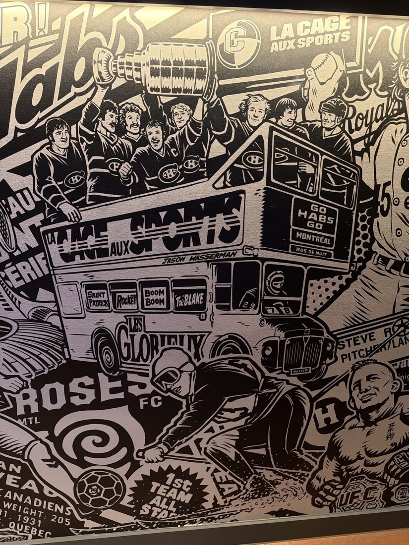 The La Cage aux Sports mural celebrating Montreal sporting history