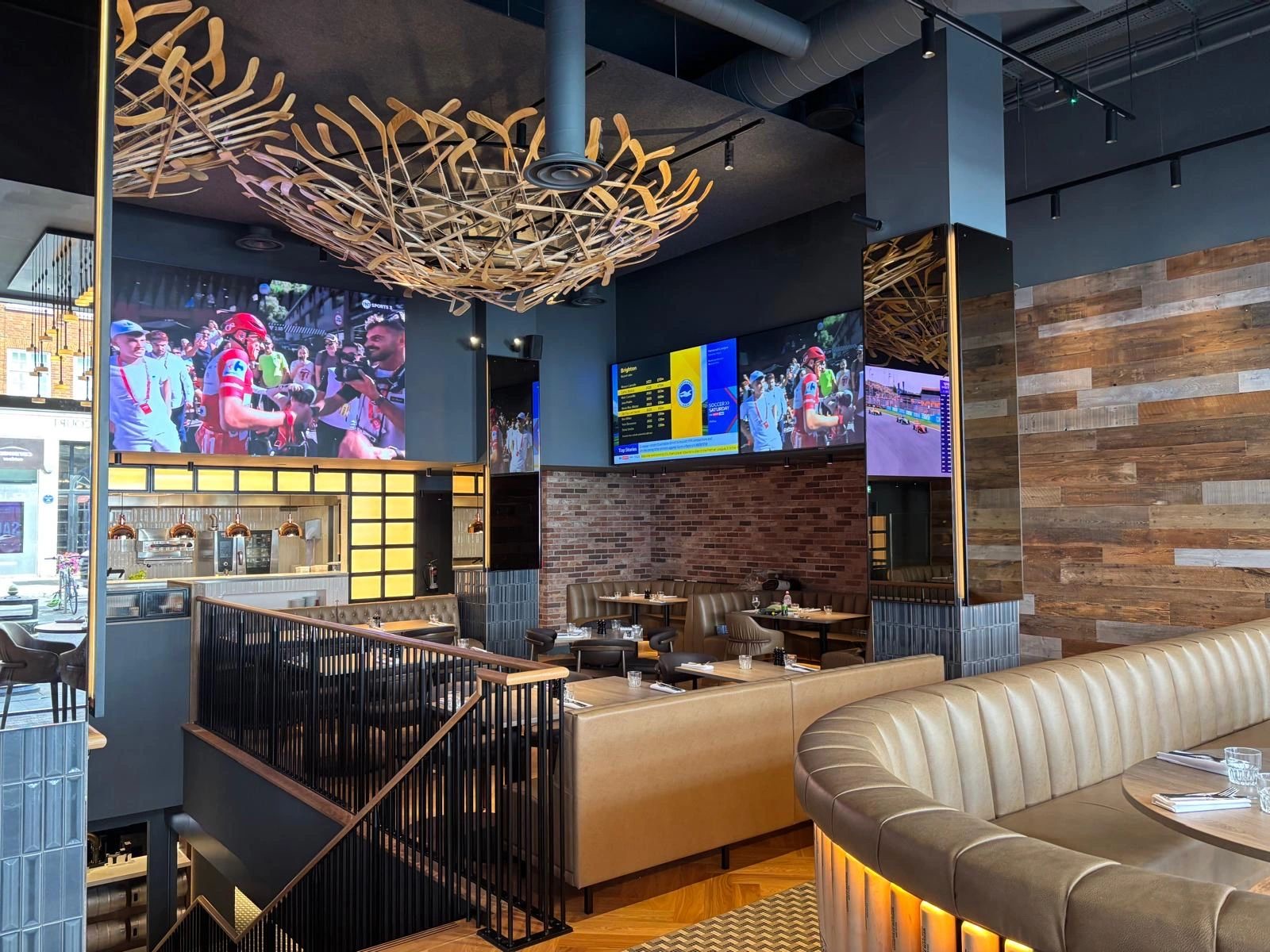 Dining room under a chandelier of hockey sticks
