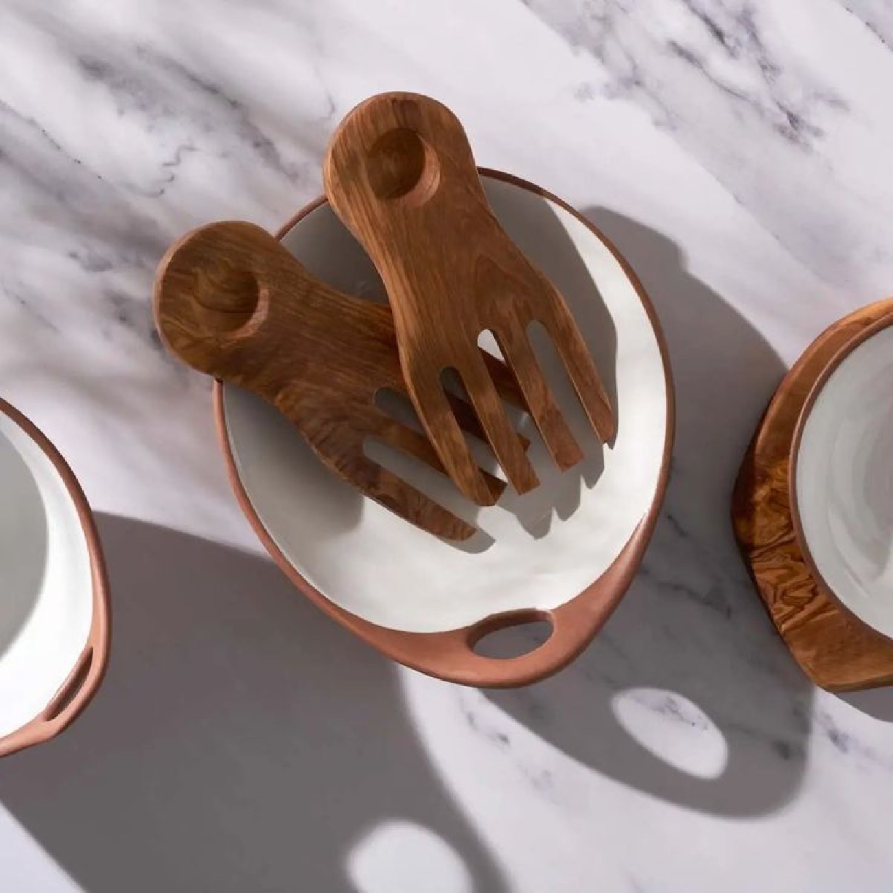 Serving bowls with wooden hands