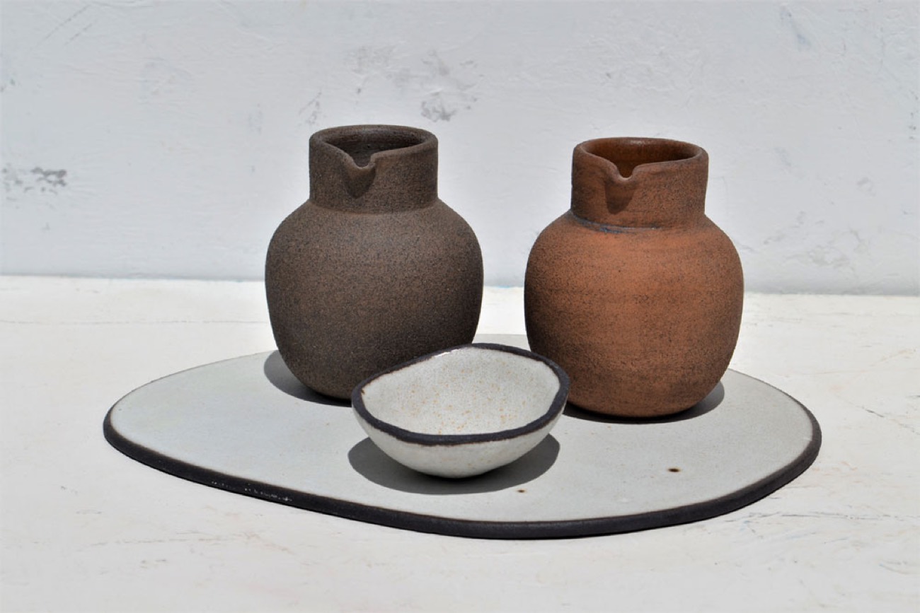 Terracotta jugs and a small bowl