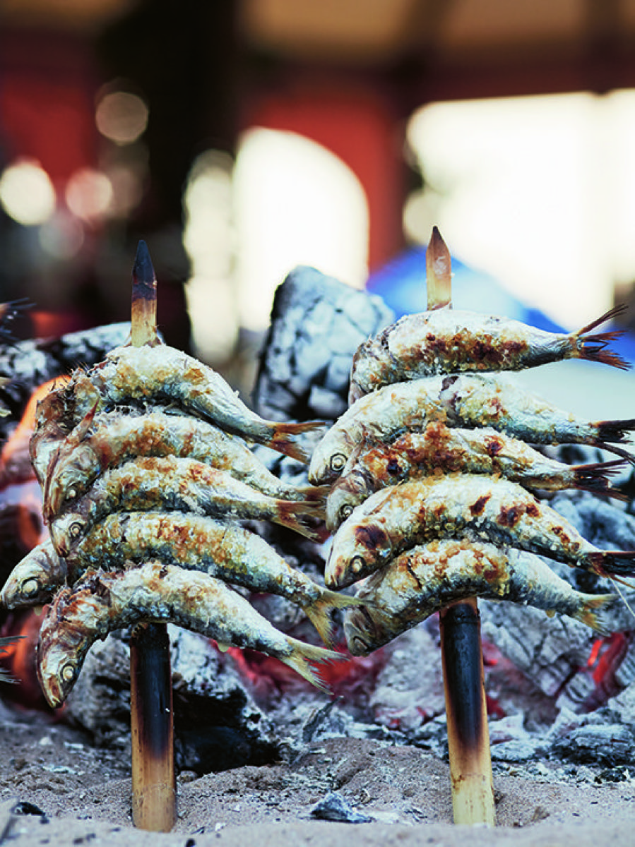 Skewers grilling over open fire