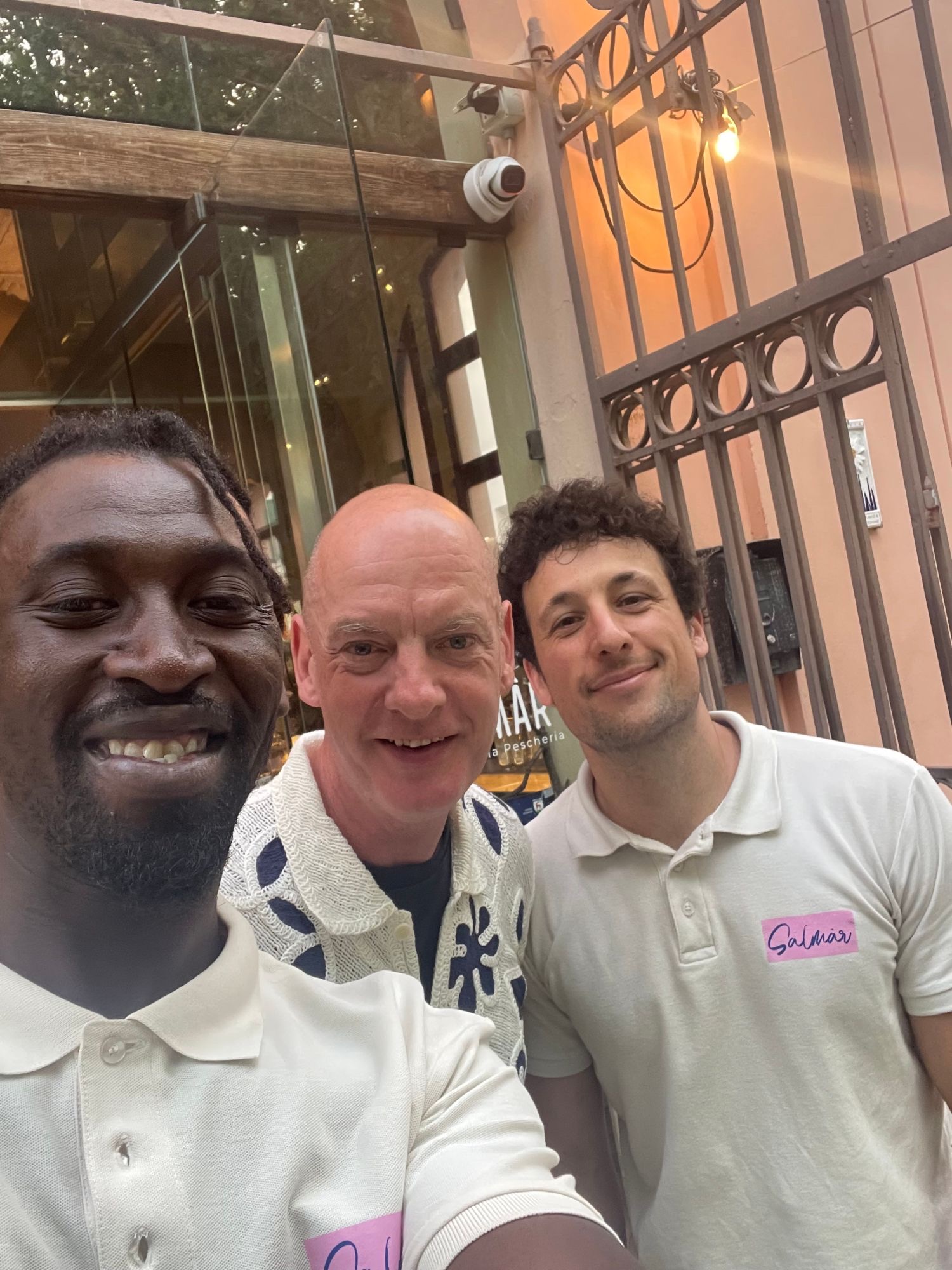 David Peevers with two of the Salmar team outside the restaurant on a summer evening